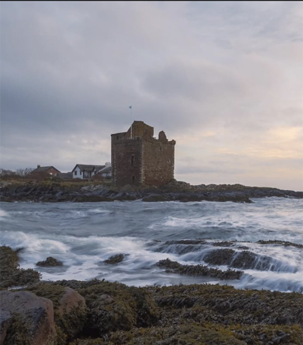 Exterior of Portencross Castle on a sunny day. 