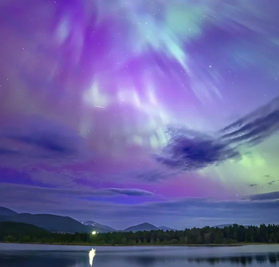 Multicolour northern lights in the sky.