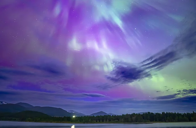 Multicolour northern lights in the sky.