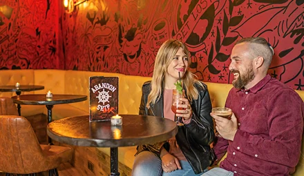 A couple enjoying a drink in Dundee