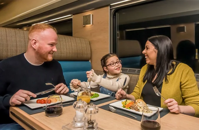 Family eating in Club Car