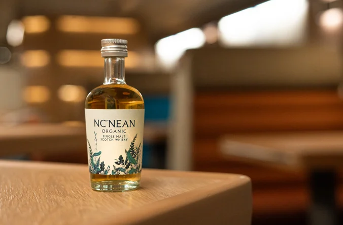 A small bottle of Whisky in the Caledonian Sleeper club car.