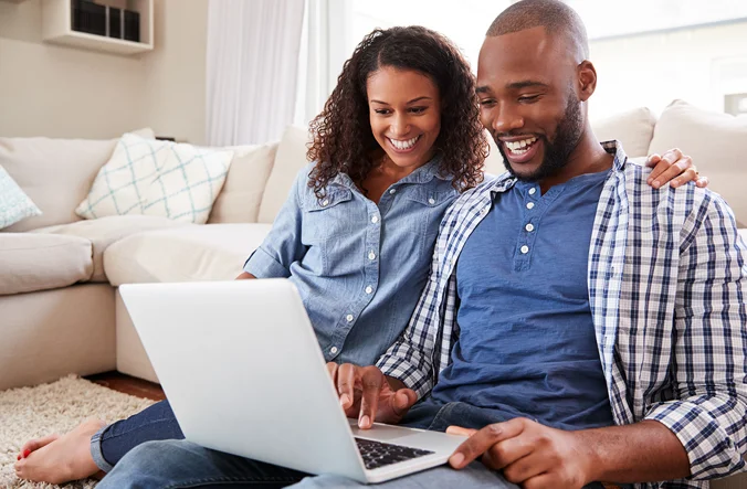 Couple with laptop