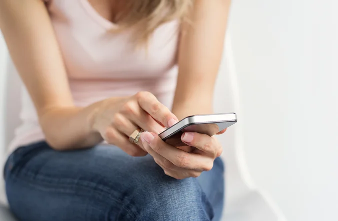 Woman using mobile phone