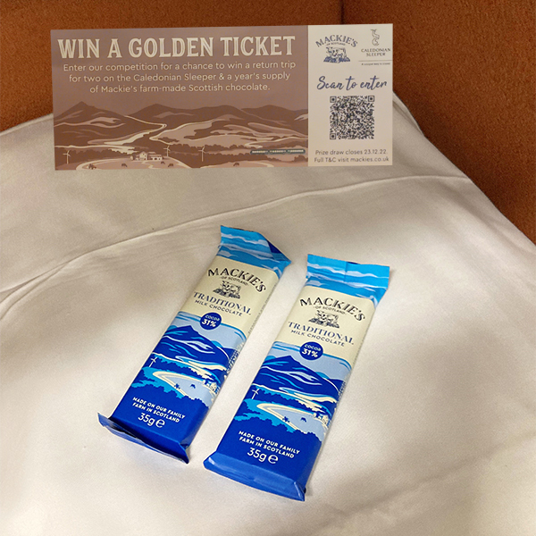 Golden ticket and bars of Mackie's chocolate on Caledonian Sleeper
