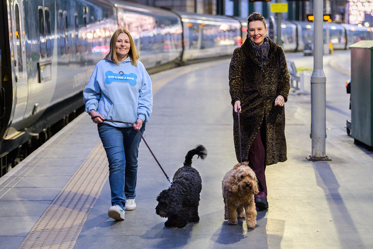 Managing Director Caledonian Sleeper and Louise Russell – Founder, Trustee and Chief Executive of Give a Dog a Bone with Cooper with two digs at Glasgow Central